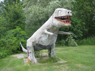 Illustration for article titled These Are The Weirdest Dinosaur Statues Ever